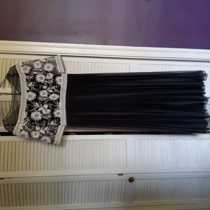 Black evening gown with floral embroidery